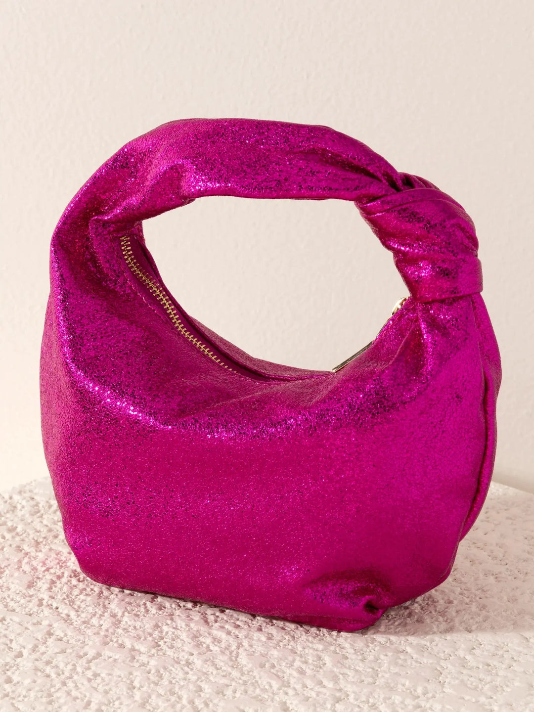CHRISSY KNOTTED METALLIC TOP HANDLE BAG SHIRALEAH