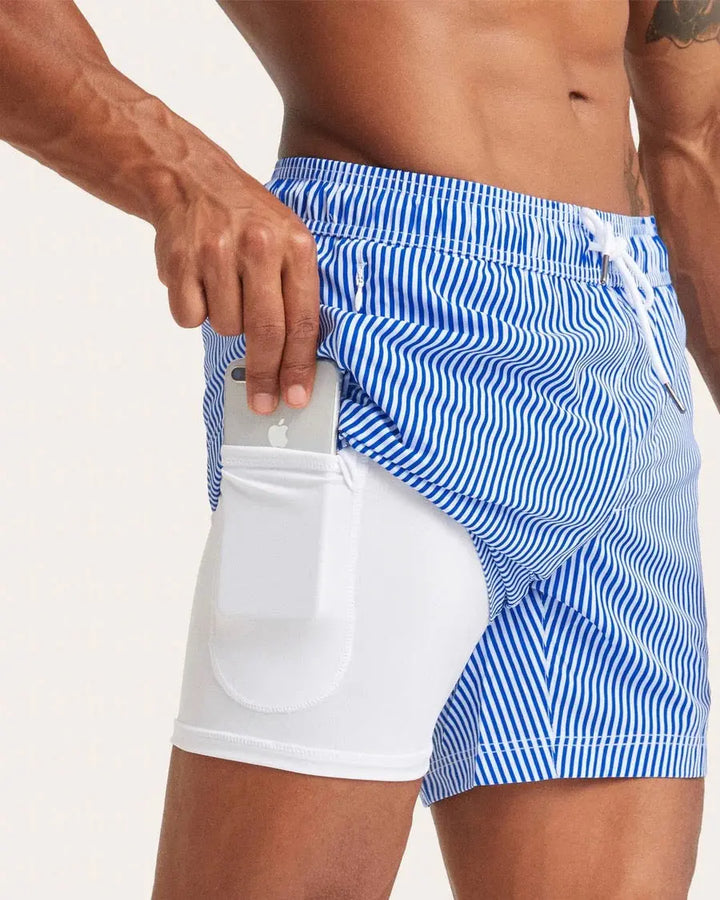 COASTSWEET STRIPED PRINT SWIM TRUNKS MAAMGIC
