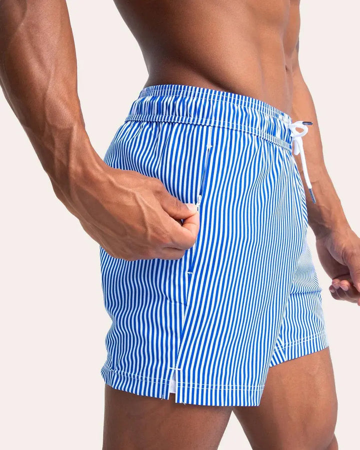 COASTSWEET STRIPED PRINT SWIM TRUNKS MAAMGIC